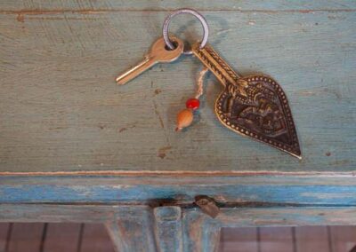 door key on blue cupboard