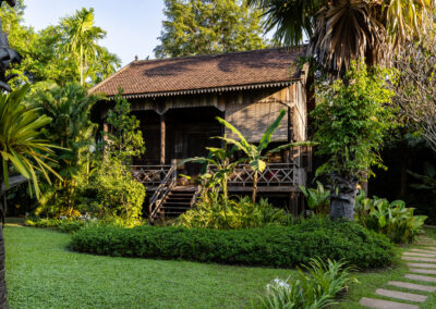exterior of House Dop Pi and garden in front