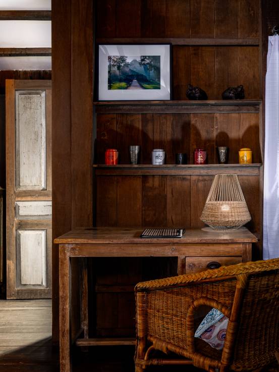 Woman walking up steps to room at Sala Lodges