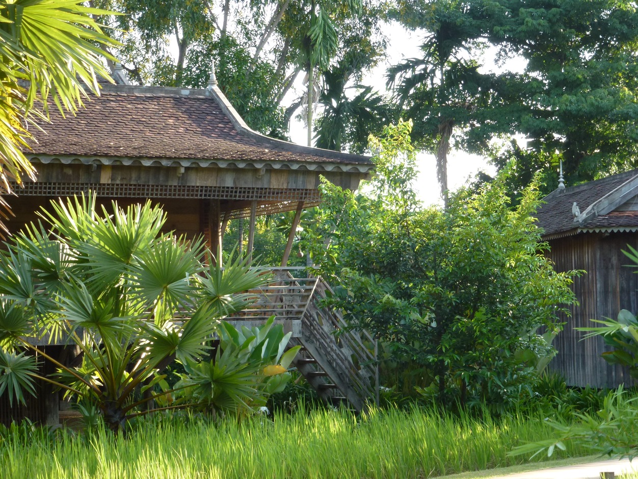Woman walking up steps to room at Sala Lodges