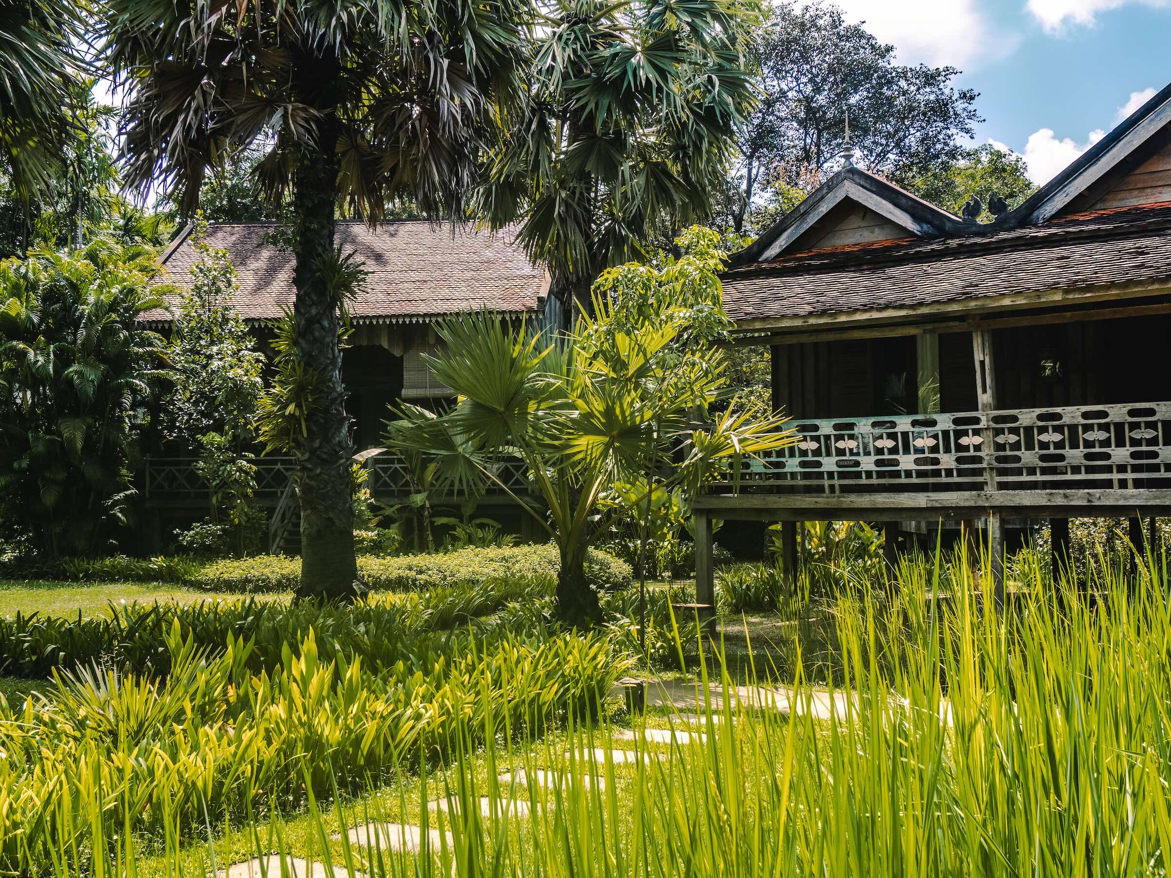 Woman walking up steps to room at Sala Lodges
